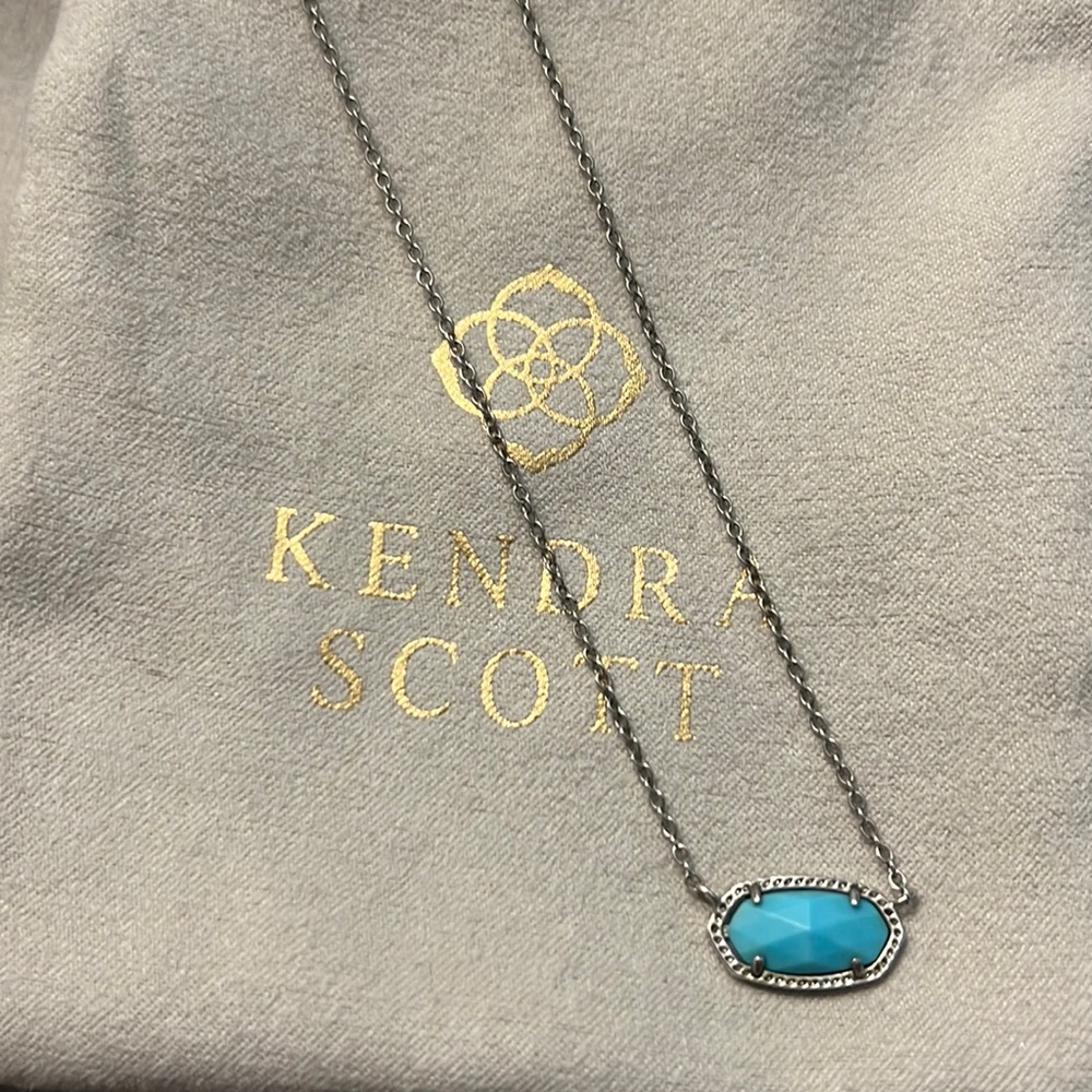 Silver Kendra Scott necklace with turquoise stone